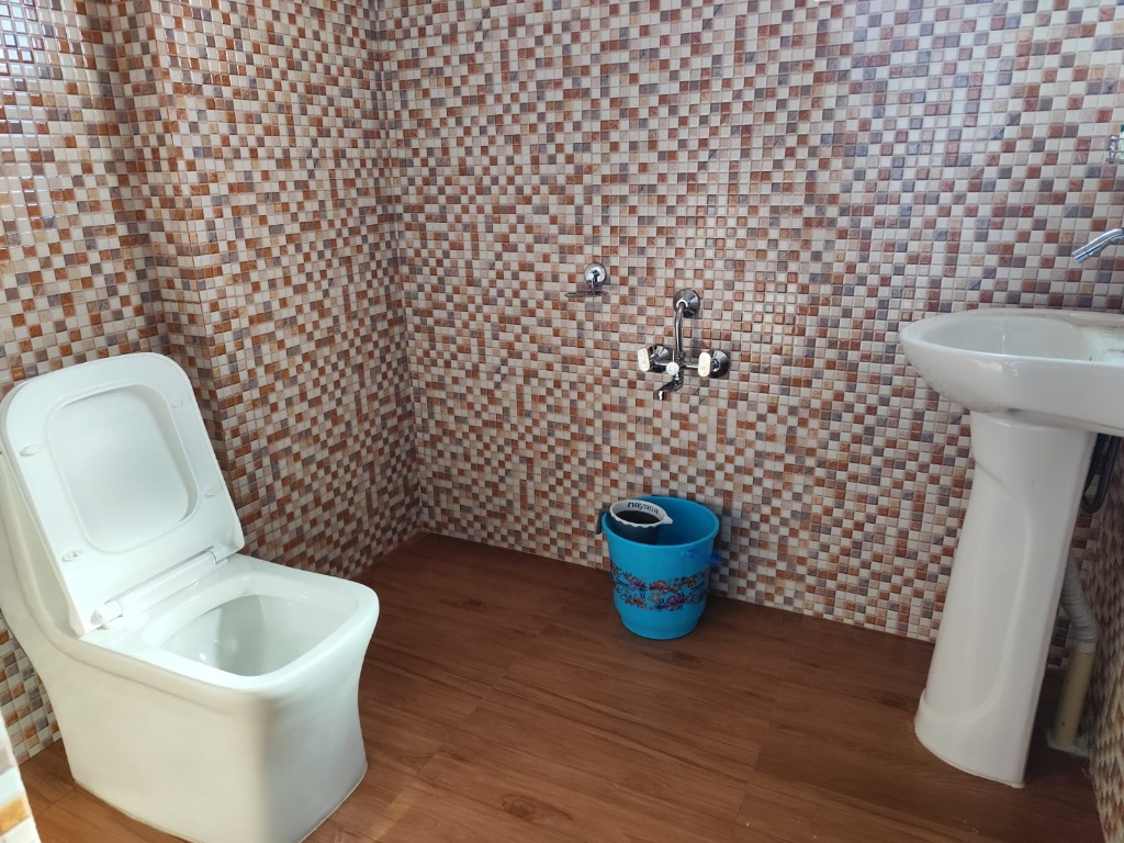Mosaic Tiled Bathroom with Hot Shower